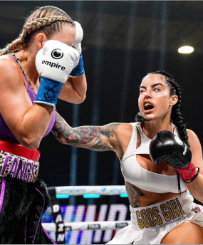 two women wearing boxing gloves