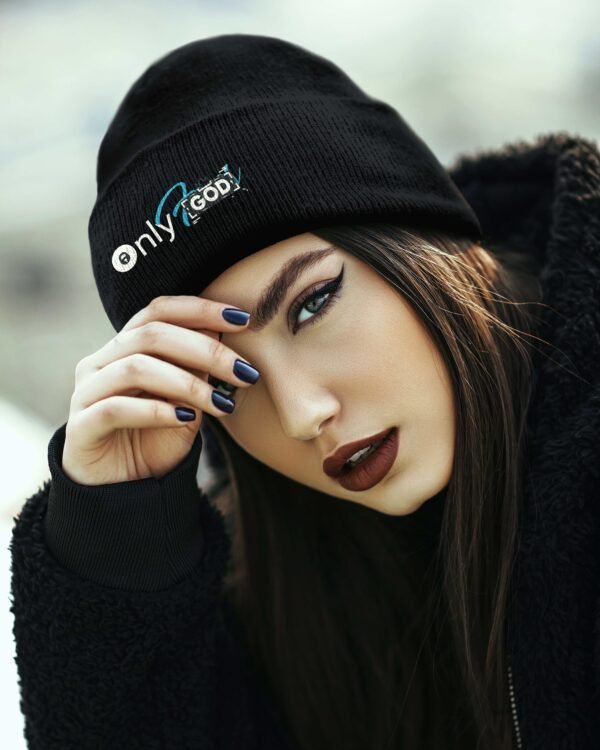 a woman with a Beanies God and a black hat